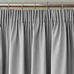 Timeless Appeal: Transforming Windows with Pleat Drapery